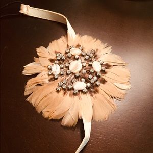 Gap fawn-colored feather and jewel headband.